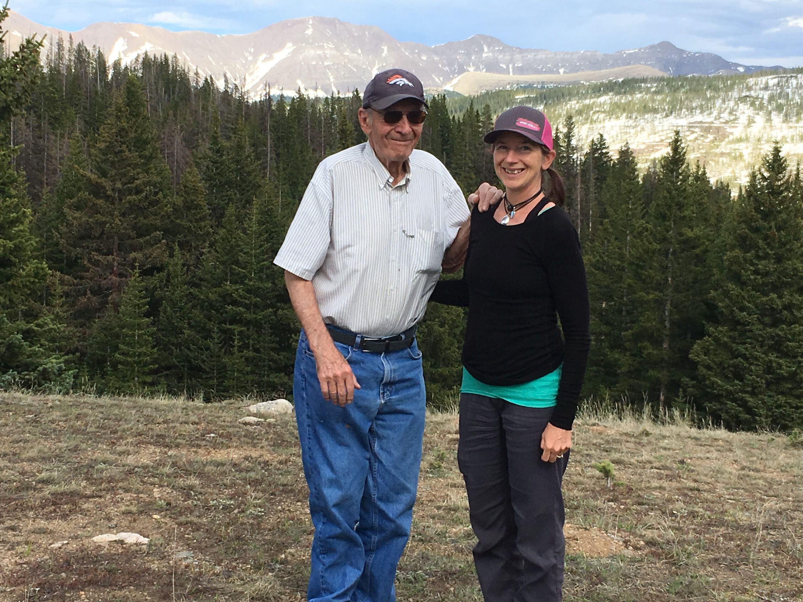Karen Sattler and her father Wolfgang Sattler, owners of Sattler Mountain Land, standing together in the alpine high country of the Sangre de Cristo Ranches in Southern Colorado